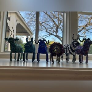 Six different Handcrafted wire/beaded figurines. See pictures, different colors